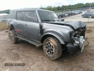 2023 Ford Bronco z VIN 1FMEE5BP0PLB18858, wystawiony jako IAAI lot #42487421 z przebiegiem 38 477 mil mil oraz . Historia ofert i sprzedaży dostępna na DreamBid. Obrazek 1.