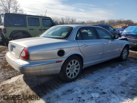 2004 Jaguar XJ with VIN SAJEA71C04SG04022, listed as a Copart auction lot 45875105 with 153,453 mi miles and Salvage Title. Bid and sale history available at carsss.com. Image 3.