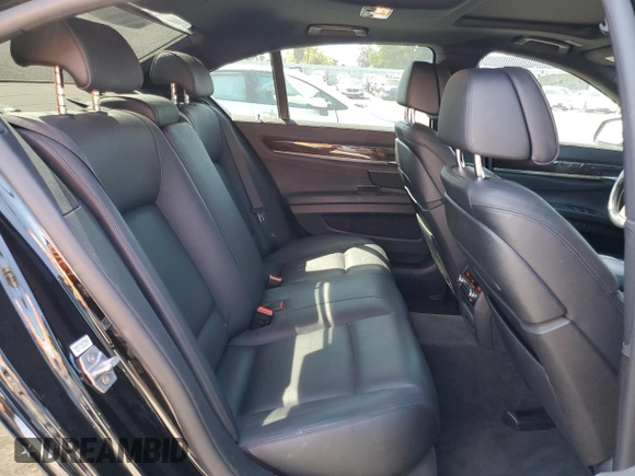 2015 BMW 7 Series 740i с VIN WBAYA6C58FD827009, выставлен на аукционе Copart как лот 50223755 с пробегом 105 440 миль миль и Списание • Salvage title. История ставок и продаж доступна на DreamBid. Изображение 10.