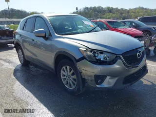 2013 Mazda CX-5 Touring with VIN JM3KE2CE6D0164430, listed as a IAAI auction lot 41961655 with 194,278 mi miles. Bid and sale history available at carsss.com. Image 1.