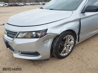 2016 Chevrolet Impala LS with VIN 2G11X5SAXG9132601, listed as a IAAI auction lot 41717761 with 129,278 mi miles. Bid and sale history available at carsss.com. Image 6.