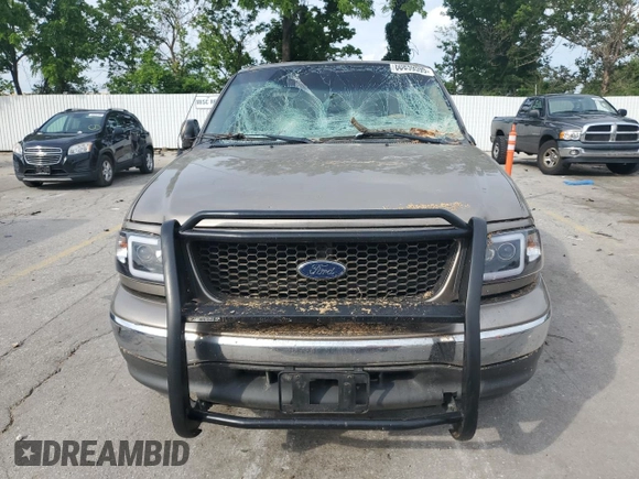 2002 Ford F-150 XL with VIN 1FTRX17L02KC02580, listed as a Copart auction lot 60859595 with 175,892 mi miles and Salvage title. Bid and sale history available at DreamBid. Image 5.