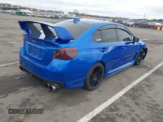 2016 Subaru WRX with VIN JF1VA1B64G9829384, listed as a IAAI auction lot 41811036 with 108,450 mi miles. Bid and sale history available at carsss.com. Image 4.
