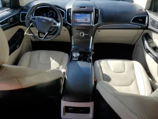 2019 Ford Edge Titanium with VIN 2FMPK4K99KBC31259, listed as a Copart auction lot 63067555 with 86,629 mi miles and Salvage title. Bid and sale history available at DreamBid. Image 8.