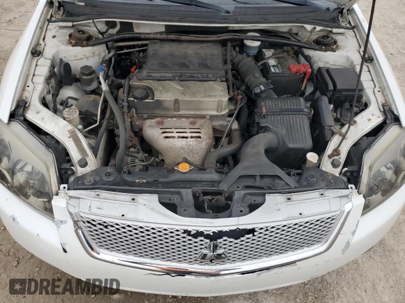 2012 Mitsubishi Galant ES z VIN 4A32B3FF5CE011838, wystawiony jako Copart lot #51344155 z przebiegiem 229 557 mil mil oraz Szkoda całkowita • Salvage title. Historia ofert i sprzedaży dostępna na DreamBid. Obrazek 13.