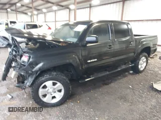 2006 Toyota Tacoma PreRunner z VIN 3TMJU62NX6M022436, wystawiony jako IAAI lot #41566792 z przebiegiem 273 922 mil mil oraz . Historia ofert i sprzedaży dostępna na DreamBid. Obrazek 2.