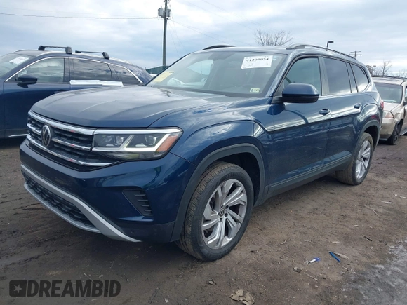 2021 Volkswagen Atlas SE with VIN 1V2JP2CA1MC548186, listed as a IAAI auction lot 41209054 with 99,071 mi miles and . Bid and sale history available at DreamBid. Image 2.