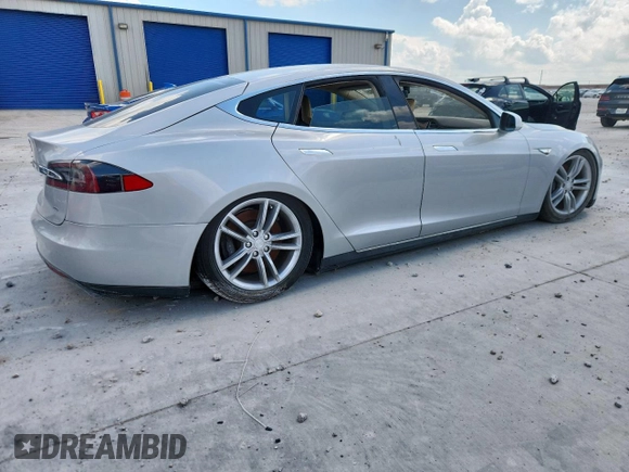 2013 Tesla Model S with VIN 5YJSA1CG5DFP03704, listed as a Copart auction lot 65143565 with Not provided miles and Clean title. Bid and sale history available at DreamBid. Image 3.
