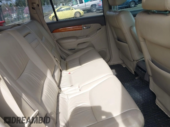 2005 Lexus GX 470 with VIN JTJBT20X650076318, listed as a IAAI auction lot 41896094 with 221,348 mi miles and . Bid and sale history available at DreamBid. Image 8.