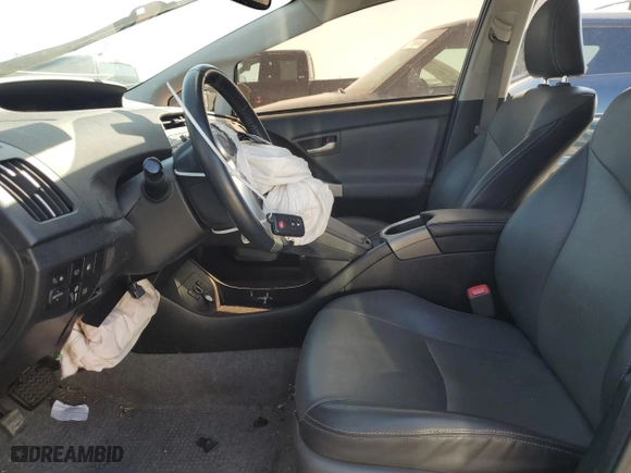 2012 Toyota Prius Plug-In with VIN JTDKN3DP9C3019460, listed as a Copart auction lot 71377474 with 100,689 mi miles and Salvage Title. Bid and sale history available at carsss.com. Image 7.