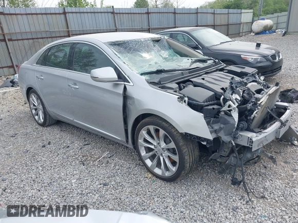 2019 Cadillac XTS Luxury z VIN 2G61M5S31K9137814, wystawiony jako IAAI lot #42144205 z przebiegiem 115 776 mil mil oraz . Historia ofert i sprzedaży dostępna na DreamBid. Obrazek 1.
