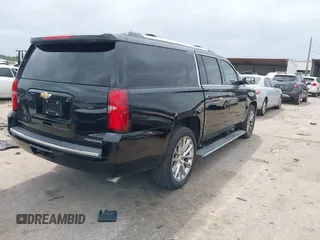 2019 Chevrolet Suburban Premier with VIN 1GNSKJKJ3KR231852, listed as a IAAI auction lot 41957728 with 136,263 mi miles and . Bid and sale history available at DreamBid. Image 4.