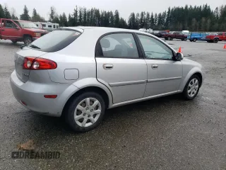 2005 Suzuki Reno S z VIN KL5JD66Z95K217050, wystawiony jako Copart lot #86785194 z przebiegiem 77 614 mil mil oraz Szkody całkowita. Historia ofert i sprzedaży dostępna na DreamBid. Obrazek 3.