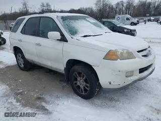 2005 Acura MDX Touring with VIN 2HNYD18625H556748, listed as a IAAI auction lot 41389869 with 201,668 mi miles. Bid and sale history available at carsss.com. Image 1.