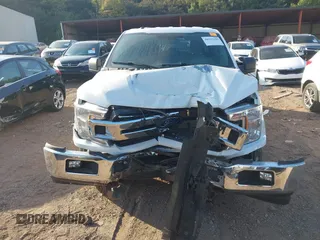 2018 Ford F-150 XL with VIN 1FTEW1E55JKF29898, listed as a IAAI auction lot 40593129 with 158,663 mi miles and . Bid and sale history available at carsss.com. Image 12.