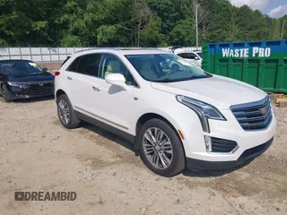 2018 Cadillac XT5 Premium Luxury FWD z VIN 1GYKNERS4JZ128051, wystawiony jako IAAI lot #42296609 z przebiegiem 86 661 mil mil oraz . Historia ofert i sprzedaży dostępna na DreamBid. Obrazek 1.