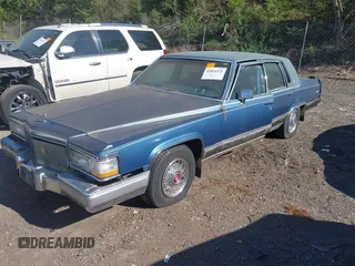 1992 Cadillac Brougham z VIN 1G6DW54EXNR707566, wystawiony jako IAAI lot #41854321 z przebiegiem Nie podano mil oraz . Historia ofert i sprzedaży dostępna na DreamBid. Obrazek 2.