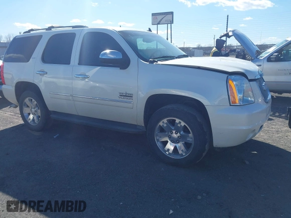 2014 GMC Yukon SLT with VIN 1GKS1CE01ER179379, listed as a IAAI auction lot 41717271 with 136,999 mi miles. Bid and sale history available at carsss.com. Image 13.
