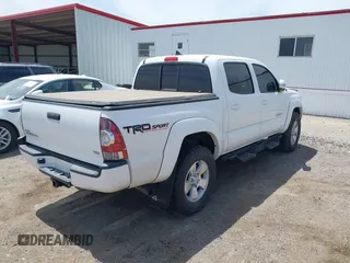 2015 Toyota Tacoma with VIN 3TMLU4EN2FM193142, listed as a IAAI auction lot 42189553 with 70,480 mi miles and . Bid and sale history available at DreamBid. Image 4.