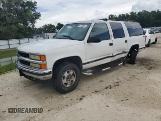 1999 Chevrolet Suburban with VIN 1GNFK16R3XJ570571, listed as a Copart auction lot 63790545 with 302,868 mi miles and Salvage title. Bid and sale history available at DreamBid. Image 1.