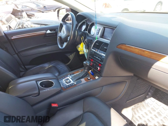 2014 Audi Q7 Premium Plus with VIN WA1LGAFE5ED014701, listed as a IAAI auction lot 42107552 with 98,919 mi miles and . Bid and sale history available at DreamBid. Image 5.