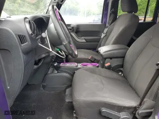 2018 Jeep Wrangler JK Unlimited Sport S with VIN 1C4BJWDG7JL882381, listed as a Copart auction lot 62986194 with 97,107 mi miles and Salvage Title. Bid and sale history available at carsss.com. Image 7.