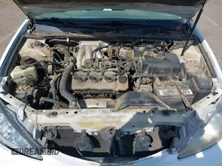 2002 Toyota Camry XLE z VIN 4T1BF32K22U032074, wystawiony jako IAAI lot #42153774 z przebiegiem 293 541 mil mil oraz . Historia ofert i sprzedaży dostępna na DreamBid. Obrazek 10.
