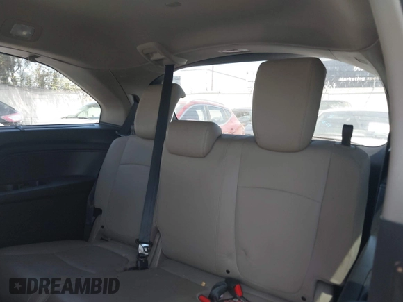 2020 Honda Odyssey Touring with VIN 5FNRL6H81LB028083, listed as a IAAI auction lot 42003810 with 71,536 mi miles and . Bid and sale history available at DreamBid. Image 17.