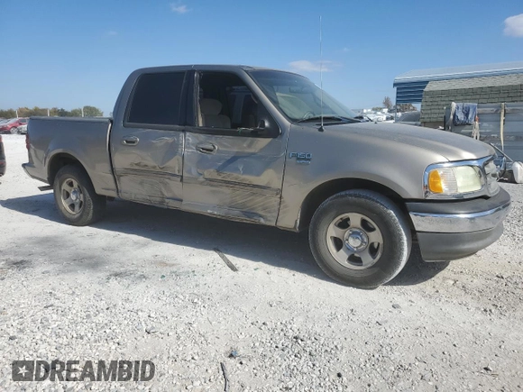 2002 Ford F-150 XLT with VIN 1FTRW07L22KB89313, listed as a Copart auction lot 76680834 with 377,443 mi miles and Salvage Title. Bid and sale history available at DreamBid. Image 4.