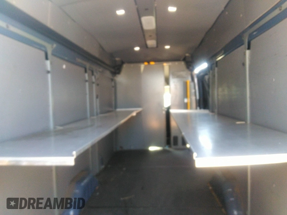 2020 Ford Transit Cargo with VIN 1FTBR3X87LKA48065, listed as a IAAI auction lot 41780797 with 82,385 mi miles. Bid and sale history available at carsss.com. Image 8.