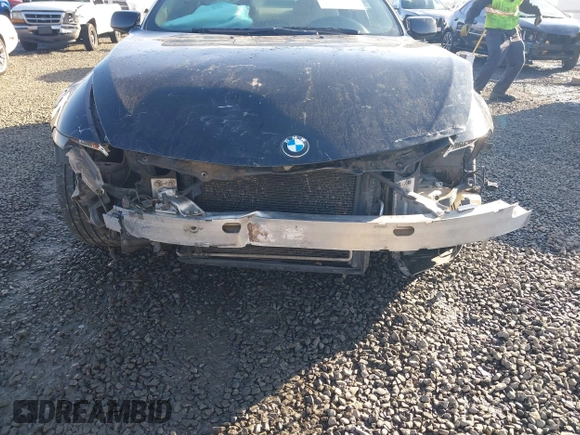 2006 BMW 6 Series 650Ci with VIN WBAEH13436CR50666, listed as a IAAI auction lot 41263683 with 1 mi miles. Bid and sale history available at carsss.com. Image 6.