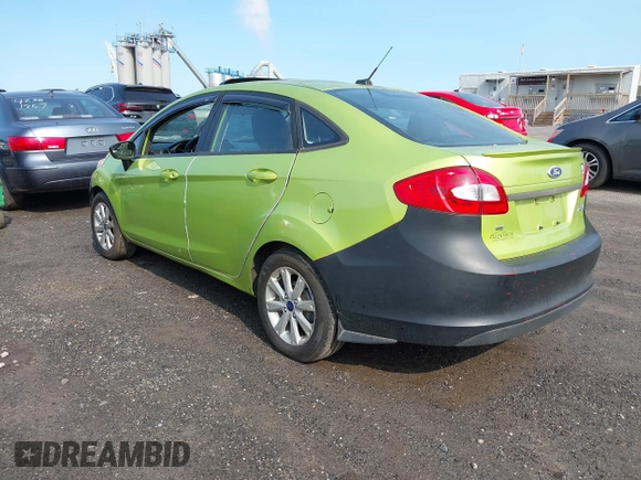 2011 Ford Fiesta SE z VIN 3FADP4BJ7BM122774, wystawiony jako IAAI lot #42392327 z przebiegiem 174 764 mil mil oraz . Historia ofert i sprzedaży dostępna na DreamBid. Obrazek 3.