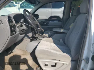 2005 GMC Envoy SLT with VIN 1GKDT13S552329269, listed as a Copart auction lot 69209244 with 154,595 mi miles and Salvage Title. Bid and sale history available at carsss.com. Image 7.