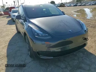 2024 Tesla Model Y with VIN 7SAYGDED3RF151031, listed as a Copart auction lot 49494165 with 7,503 mi miles and Salvage Title. Bid and sale history available at DreamBid. Image 12.