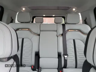 2023 Rivian R1S Adventure z VIN 7PDSGABA1PN009442, wystawiony jako Copart lot #55835815 z przebiegiem 28 048 mil mil oraz Szkody całkowita. Historia ofert i sprzedaży dostępna na DreamBid. Obrazek 10.