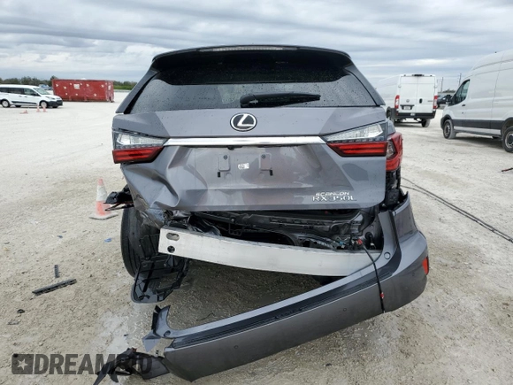 2021 Lexus RX 350L z VIN JTJHZKEA4M2018613, wystawiony jako Copart lot #89056175 z przebiegiem 40 592 mil mil oraz Nie do naprawy • Non repairable. Historia ofert i sprzedaży dostępna na DreamBid. Obrazek 6.