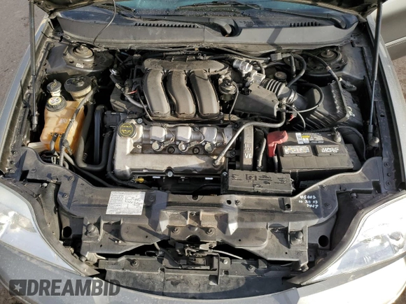 2004 Mercury Sable LS Premium z VIN 1MEHM55SX4G602026, wystawiony jako Copart lot #86291064 z przebiegiem 68 275 mil mil oraz Szkoda całkowita • Salvage title. Historia ofert i sprzedaży dostępna na DreamBid. Obrazek 12.