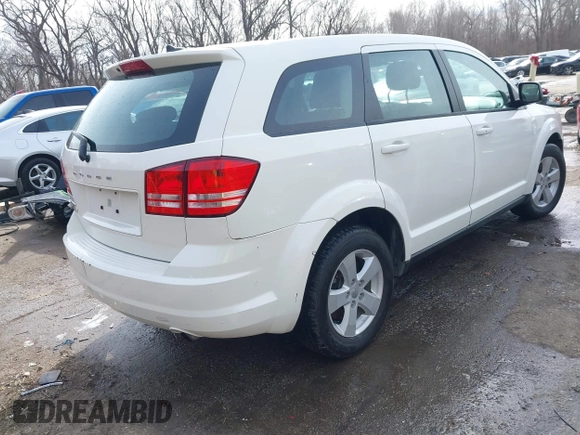 2013 Dodge Journey SE with VIN 3C4PDCAB3DT536714, listed as a IAAI auction lot 41699265 with 160,000 mi miles. Bid and sale history available at carsss.com. Image 4.