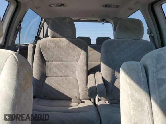 2003 Honda Odyssey EX z VIN 5FNRL18673B014271, wystawiony jako Copart lot #68613374 z przebiegiem 236 360 mil mil oraz Nie do naprawy • Non repairable. Historia ofert i sprzedaży dostępna na DreamBid. Obrazek 10.