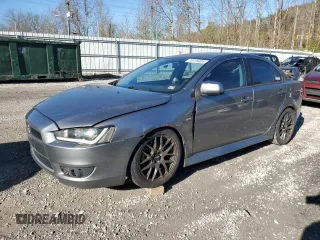 2014 Mitsubishi Lancer SE with VIN JA32V2FW9EU010025, listed as a Copart auction lot 79736404 with 162,678 mi miles and Salvage Title. Bid and sale history available at carsss.com. Image 1.