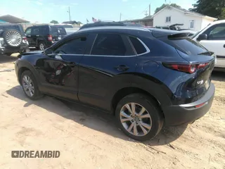 2022 Mazda CX-30 S Carbon Edition with VIN 3MVDMBCL6NM423255, listed as a IAAI auction lot 42209829 with 51,589 mi miles and . Bid and sale history available at DreamBid. Image 3.
