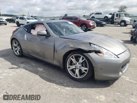 2010 Nissan 370Z Touring with VIN JN1AZ4EH8AM501134, listed as a Copart auction lot 73919614 with 106,599 mi miles and Salvage Title. Bid and sale history available at carsss.com. Image 4.