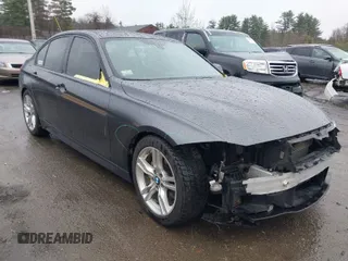 2013 BMW 3 Series 335i xDrive with VIN WBA3B9C54DF586608, listed as a IAAI auction lot 41933738 with 133,423 mi miles. Bid and sale history available at carsss.com. Image 1.