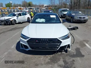 2021 Audi S7 Prestige z VIN WAUSFBF22MN075994, wystawiony jako IAAI lot #41903379 z przebiegiem Nie podano mil oraz . Historia ofert i sprzedaży dostępna na DreamBid. Obrazek 12.