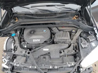 2017 BMW X1 xDrive28i with VIN WBXHT3C37H5F86637, listed as a IAAI auction lot 41300161 with 95,459 mi miles. Bid and sale history available at carsss.com. Image 10.