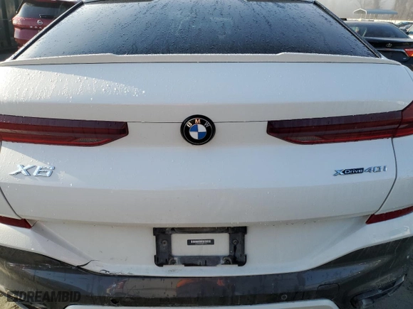 2022 BMW X6 xDrive40i with VIN 5UXCY6C00N9K74725, listed as a Copart auction lot 85287764 with 48,875 mi miles and Salvage Title. Bid and sale history available at carsss.com. Image 6.