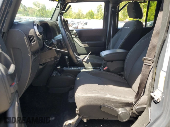 2017 Jeep Wrangler Unlimited Rubicon z VIN 1C4BJWFG6HL724069, wystawiony jako Copart lot #55773055 z przebiegiem 64 515 mil mil oraz Szkoda całkowita • Salvage title. Historia ofert i sprzedaży dostępna na DreamBid. Obrazek 7.