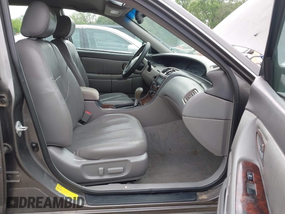 2003 Toyota Avalon XL with VIN 4T1BF28B53U285411, listed as a IAAI auction lot 42140722 with 282,407 mi miles and . Bid and sale history available at carsss.com. Image 5.