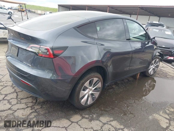 2022 Tesla Model Y Long Range with VIN 7SAYGDEE8NF317482, listed as a IAAI auction lot 41806043 with 32,108 mi miles and . Bid and sale history available at carsss.com. Image 4.