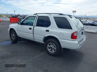 2001 Isuzu Rodeo S z VIN 4S2CK58W614329085, wystawiony jako IAAI lot #42303013 z przebiegiem 171 933 mil mil oraz . Historia ofert i sprzedaży dostępna na DreamBid. Obrazek 3.